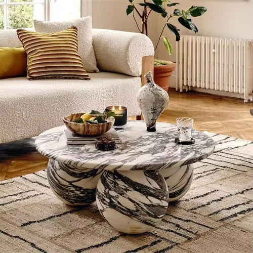 Discover the Zeenia Marble Coffee Table—an ultra-luxury sculptural centre table carved from premium marble. A true statement piece for modern, wabi-sabi and contemporary interiors. Marble options available. Luxury Coffee Table in Marble online 