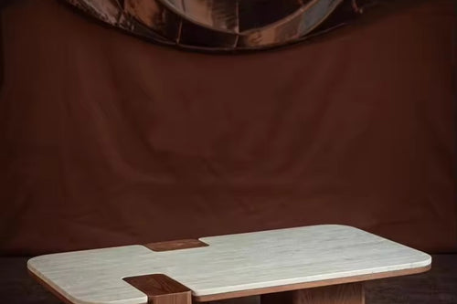 Japandi coffee table with travertine marble top and wooden base in walnut finish