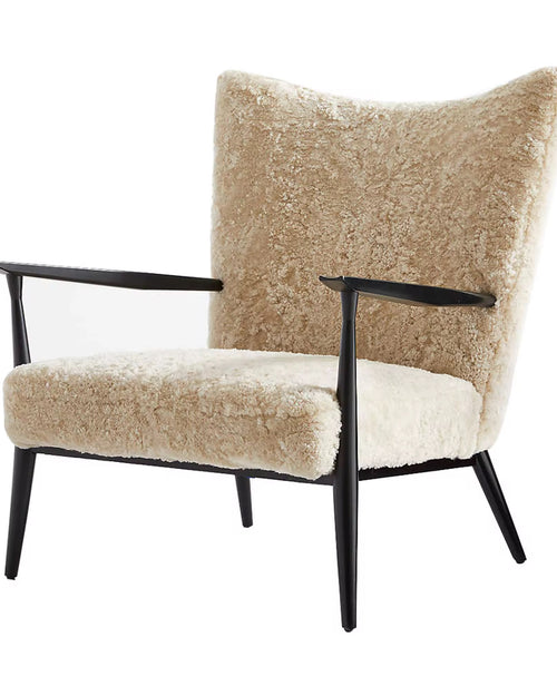 Modern Zephyr accent chair showing plush boucle