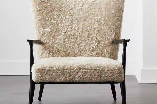 Zephyr wingback accent chair with black wooden legs