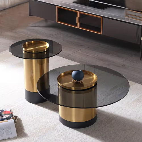 Two modern side tables with gold and black finish.