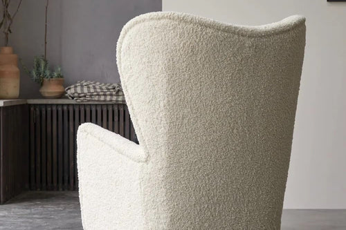 Back view of white textured armchair