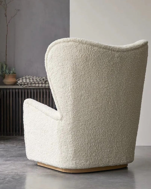 Back view of white textured armchair