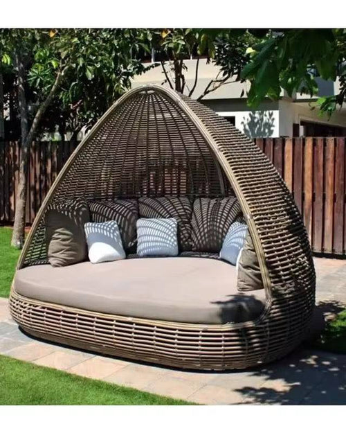 Dome-shaped outdoor lounge bed side profile