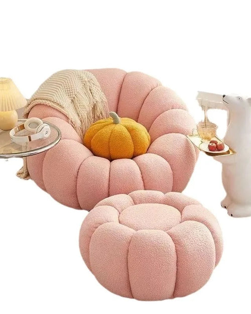Top view of the Kandis Round Chair in pink with floral cushion