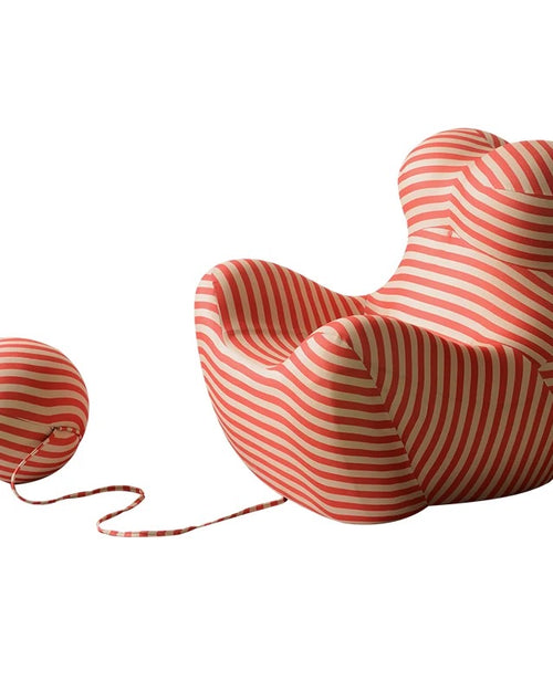 Kiki Play Chair highlighting its smooth rounded form and luxurious feel