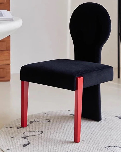 Koina Chair in black with red legs