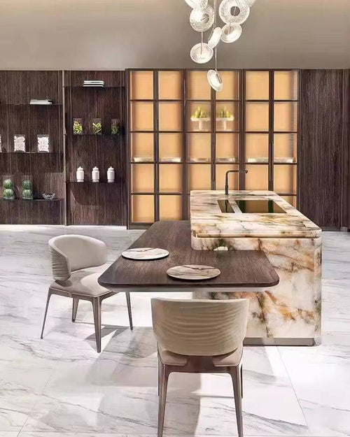 Modern kitchen with marble island and dining table set