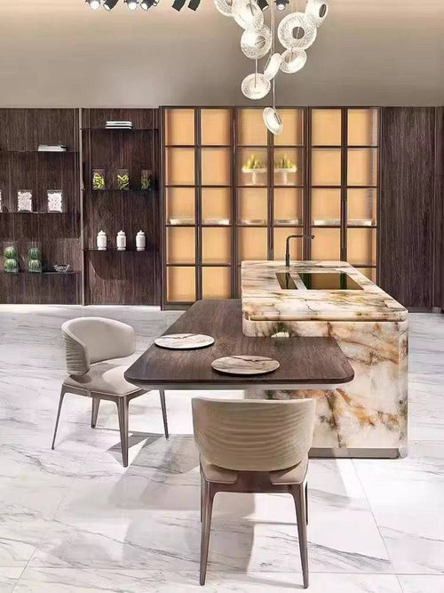 Modern kitchen with marble island and dining table set