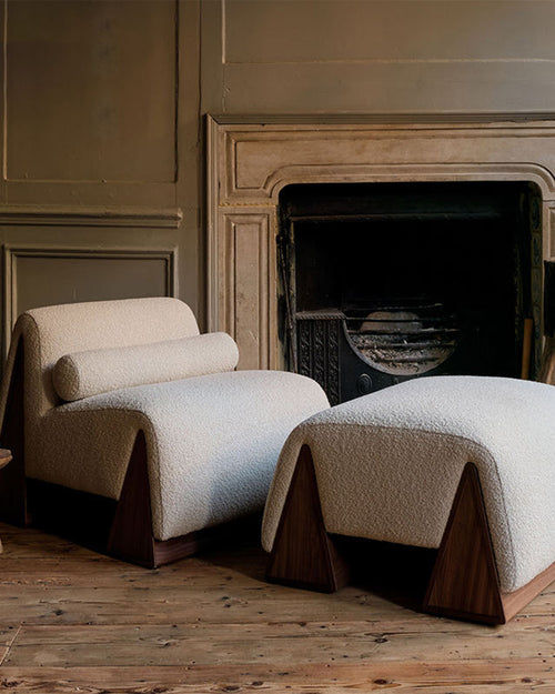 Modern armchair and ottoman set in a room 