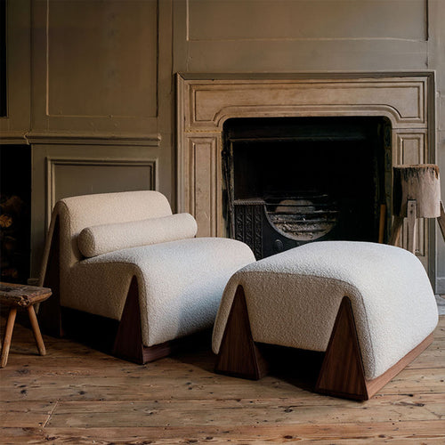 Modern armchair and ottoman set in a room 