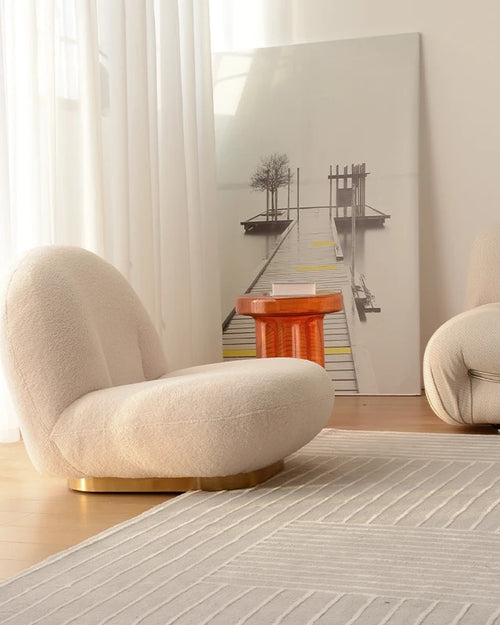 Beige Teddy chair with low seating and 360 base