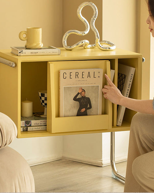 Front angled view of yellow Norbu console with storage compartments